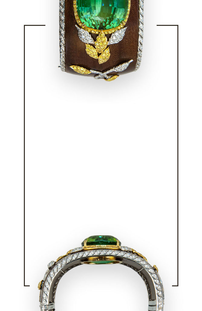 Laura Munder Fernambuk wood hinged cuff set with 76.21 carat Green Tourmaline a leaf design set with yellow and white diamonds