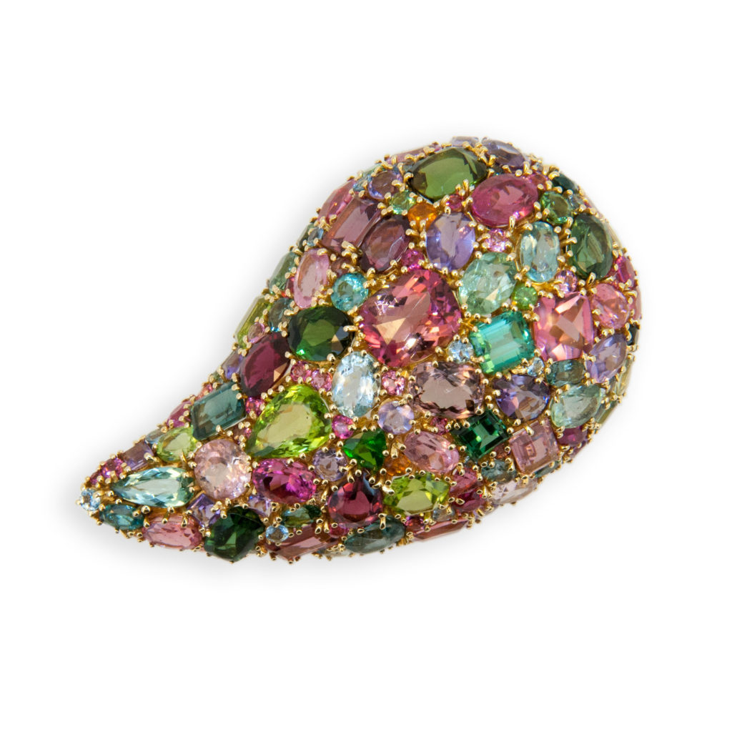 18 karat yellow gold paisley-teardrop shaped brooch, multi-color tourmaline stones of various shapes and peridot.
