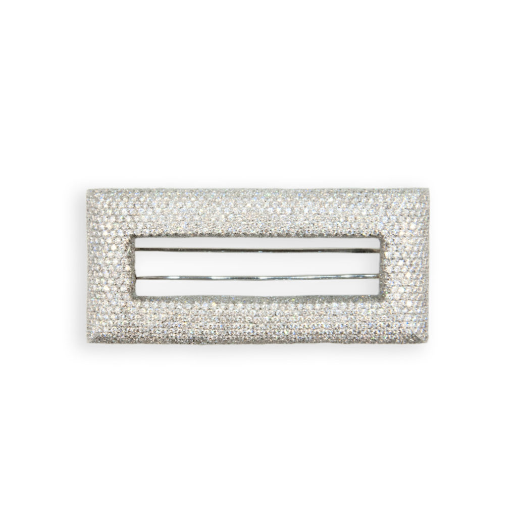 18 karat white Pave' diamond brooch, rectangular buckle design, set with 1280 diamonds 15.14 carats.