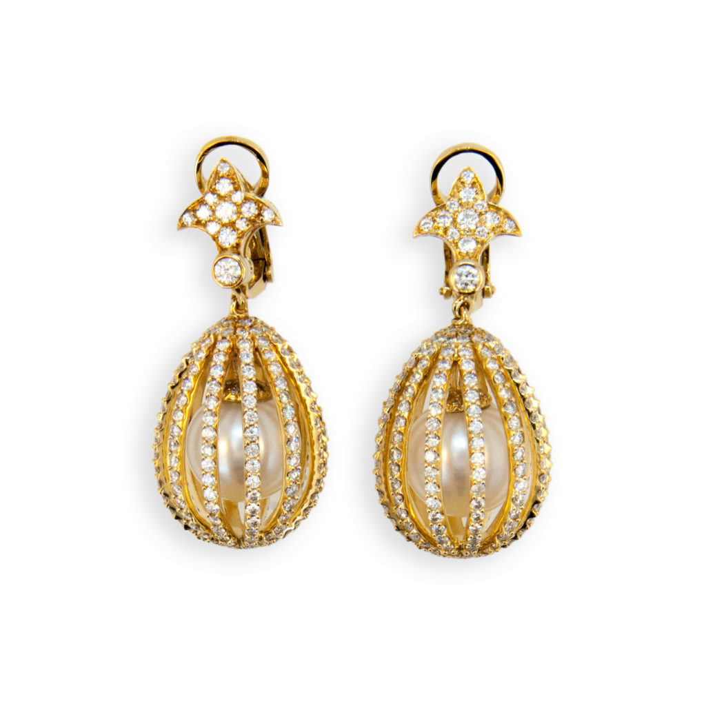 18 karat yellow gold Cage earrings set with 13 mm South Sea Pearls and 500 Diamonds 6.99 carats total weight