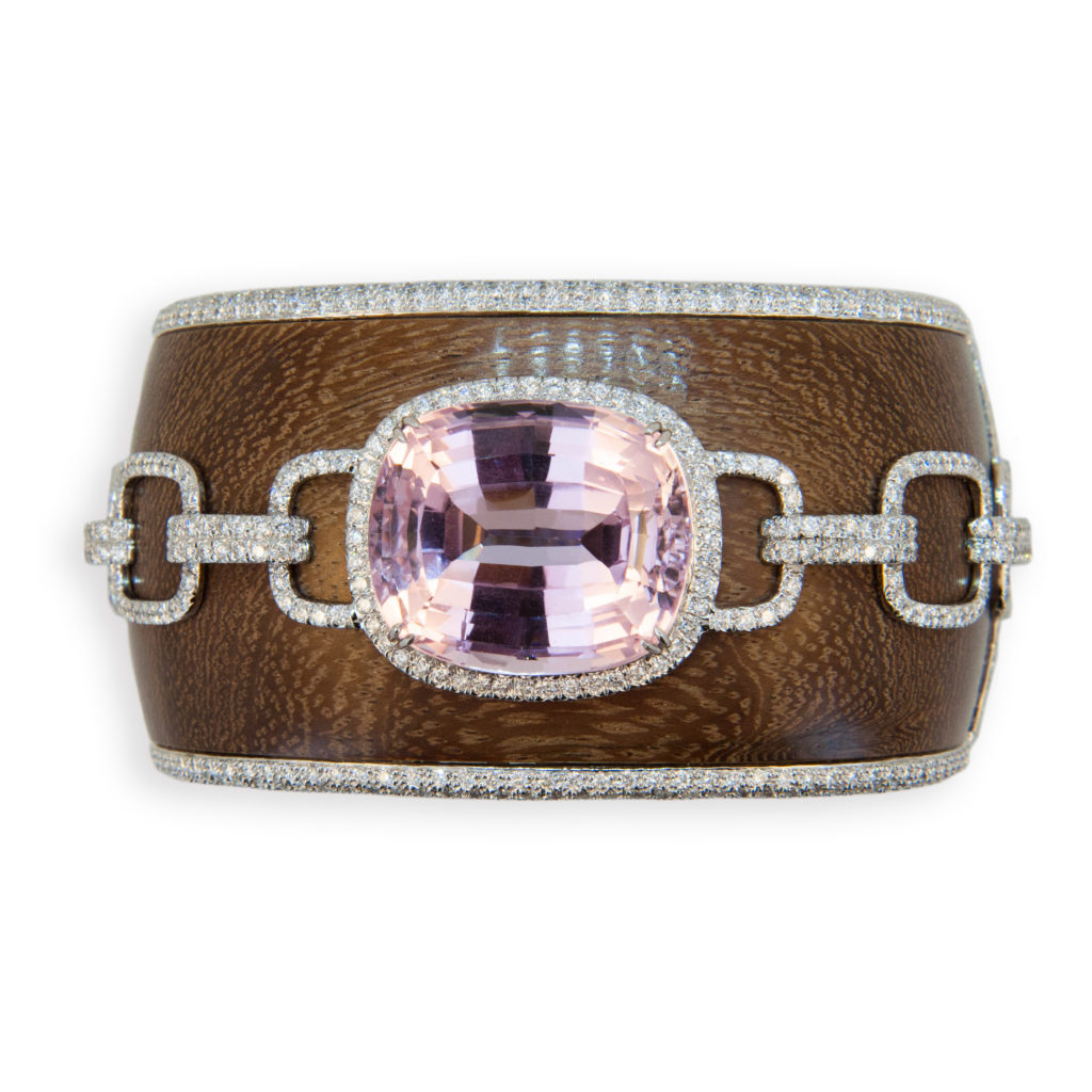 18 karat white gold bangle bracelet, wood bangle, 1.5 inches wide with pave' diamond edge. Bangle is set with one cushion cut Kunzite 57.81 carats and 946 round Diamonds 10.22 carats total weight are set on edges and around Kunzite and in link design extending out from Kunzite. Amaranth wood.