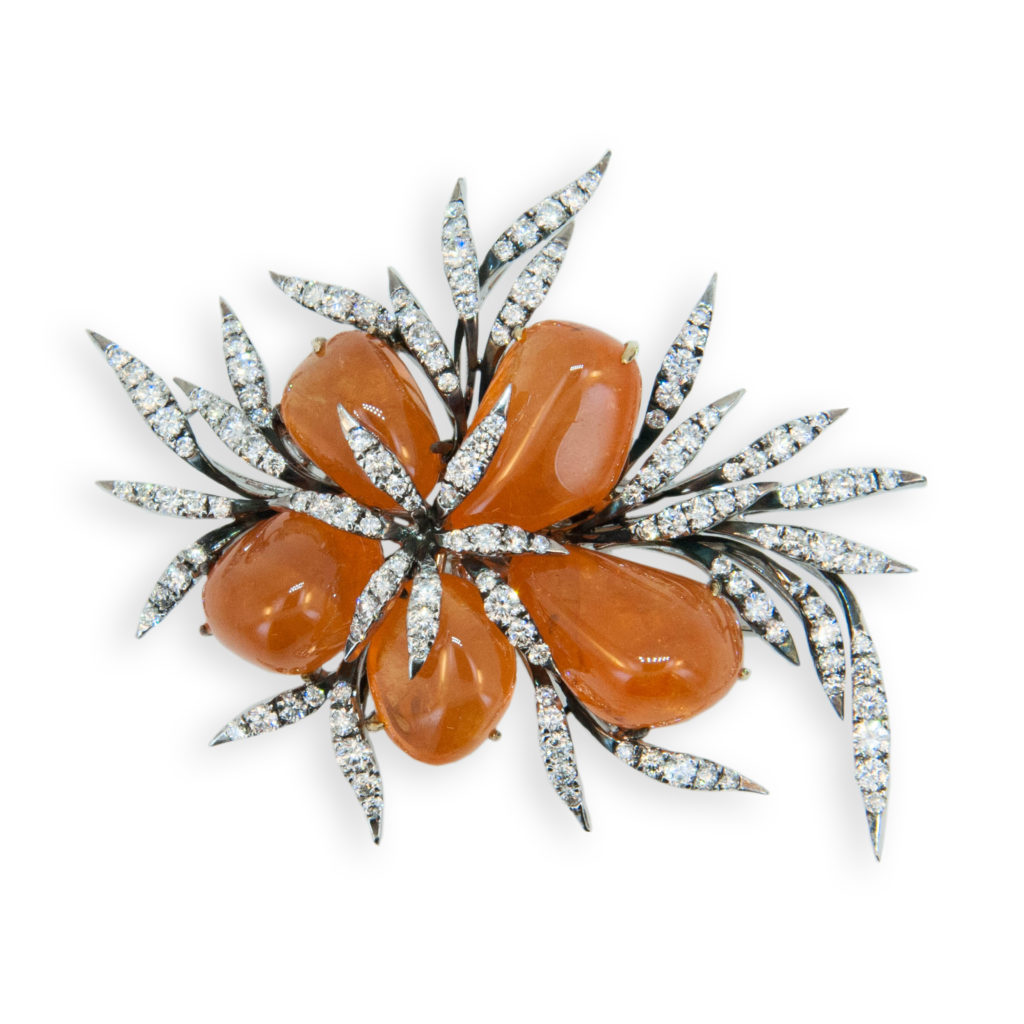 18K blackened yellow and white gold brooch with five freeform tumble polished Mandarin Garnets 70.57cts.twt and 141 round diamonds set in pointed slim organic leaf pattern 3.32cts.twt