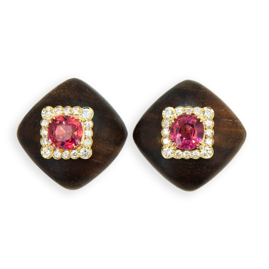 18 karat yellow gold earrings squarish shaped dark wood each set with one Pink Spinel cushion shaped oval (2) Spinel 3.33 carats total weight. Square frame each set with (16) Diamonds (32) Diamonds total .68 carat total weight. Posts and Clips.
