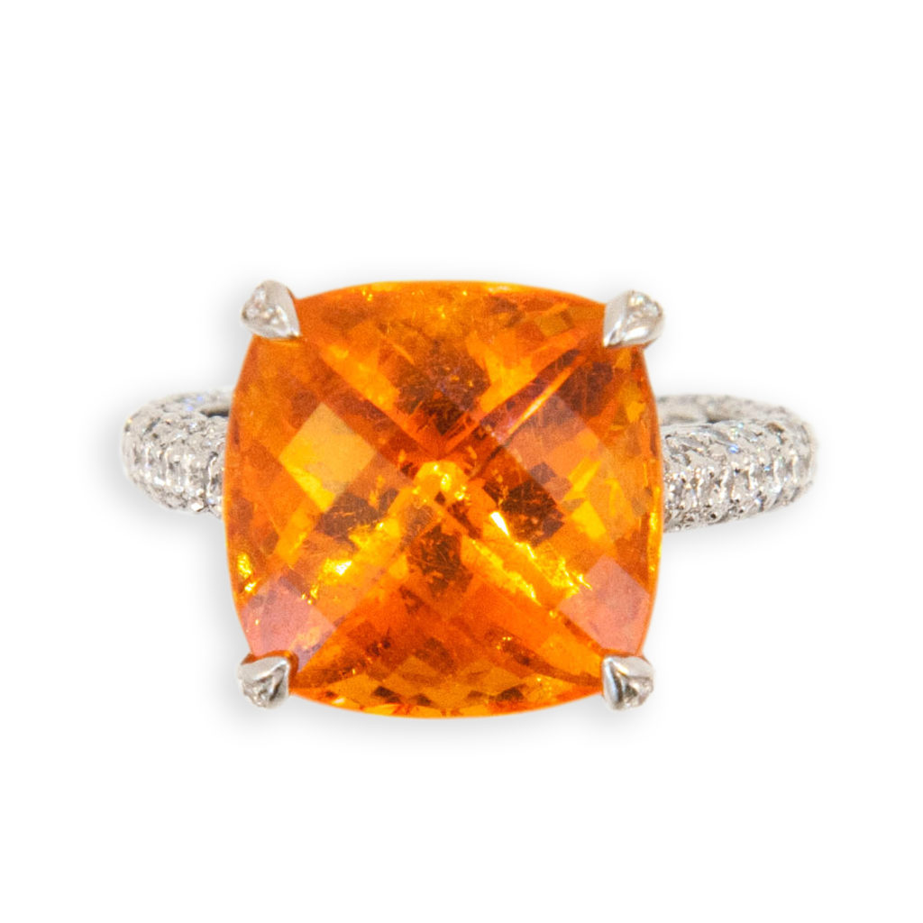 18 karat white gold ring set with one faceted cushion cut Mandarin Garnet 15.10 carats shank, under bezel and prongs are set with 234 round Diamonds 1.94 carats total weight. Ring is a size 6.25 with a horseshoe.