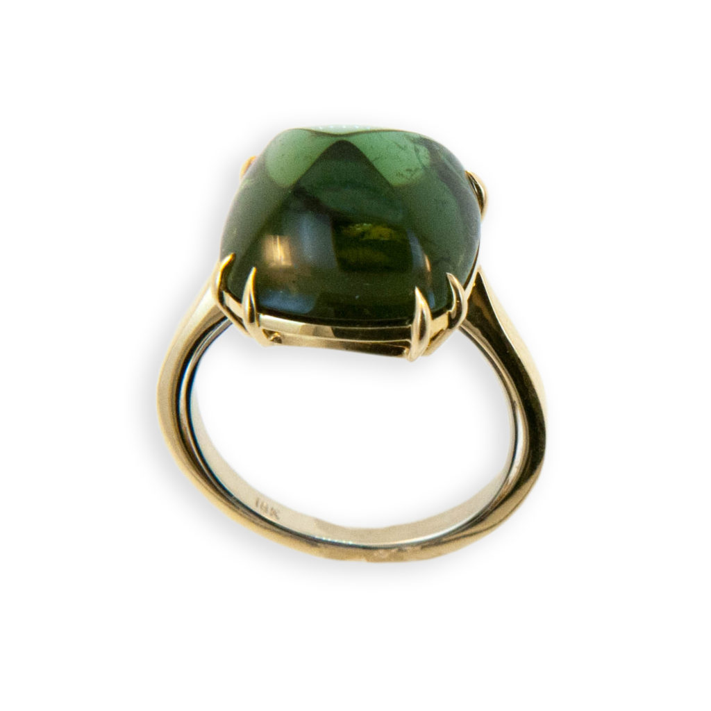18 karat yellow gold ring set with one square cushion cut sugarloaf Green Tourmaline 8.96 carats. Double prongs. Ring is a size 6.5 with a horseshoe.