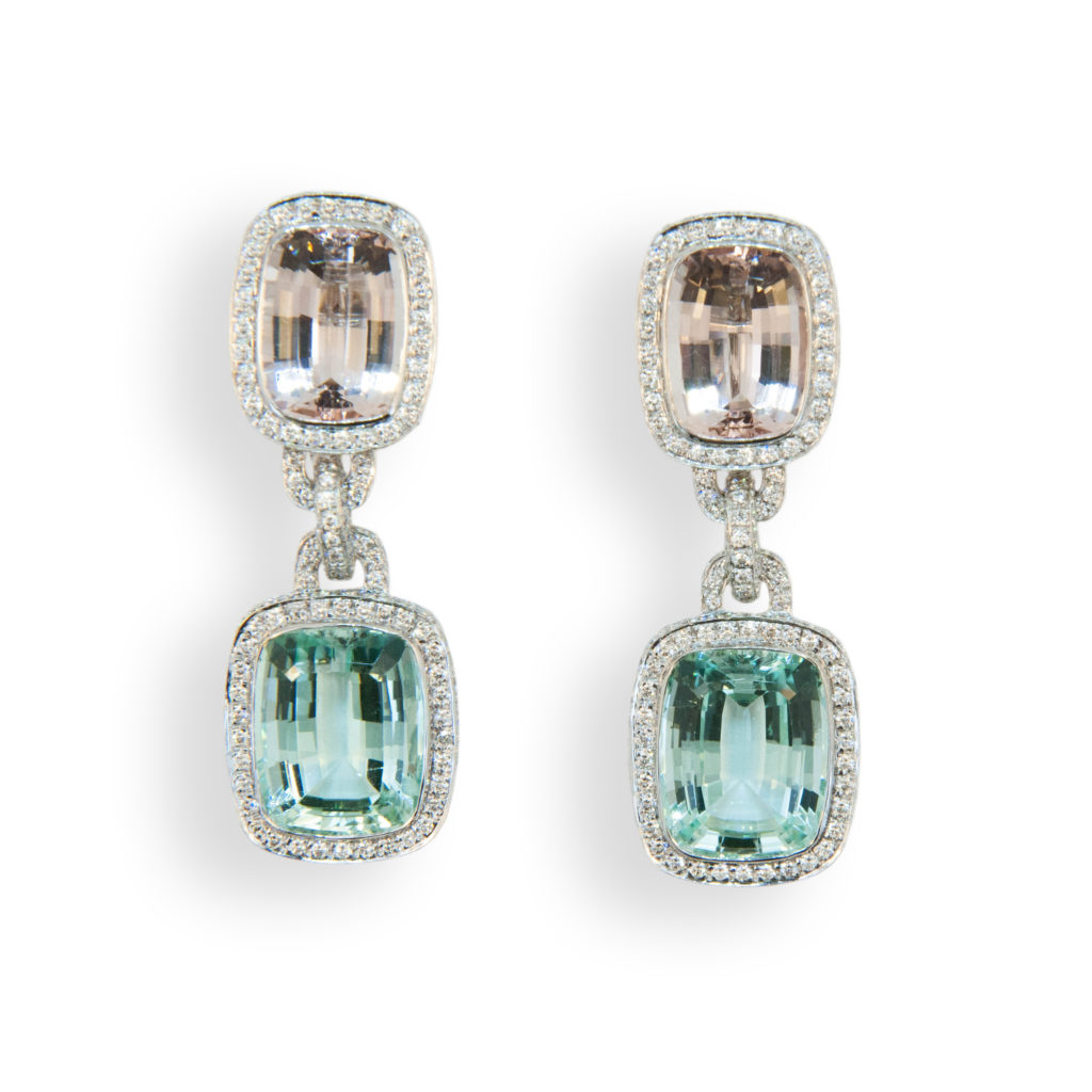 18 karat white gold drop earrings faceted rectangular cushion Mint Green Tourmaline and Morganite and diamond earrings. Tourmaline (2) 19.46 carats Morganite (2) 10.29 carats 562 Diamonds 3.57 carats total weight. May be worn as pierced or as clip on earrings.